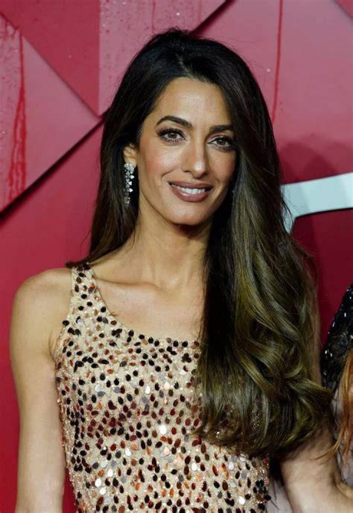 Amal Clooney Is Dazzling in a Yellow Sequined Minidress While in London