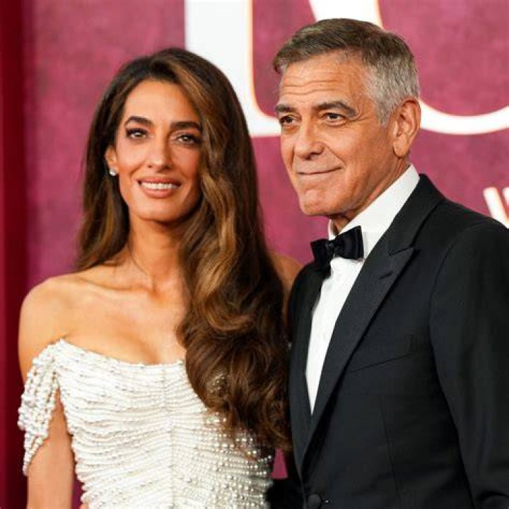 Amal Clooney's pregnancy chic wife shows off her baby bump in