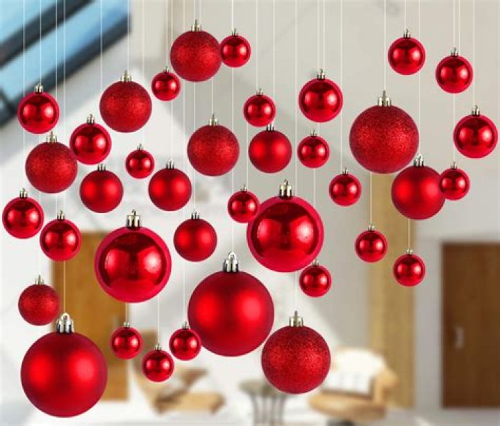 an ornament hanging from a christmas tree with the words diy memorial