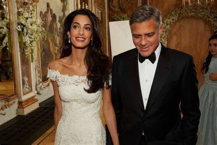Clooney and Amal Clooney Make Stylish Arrival in Venice Ahead of