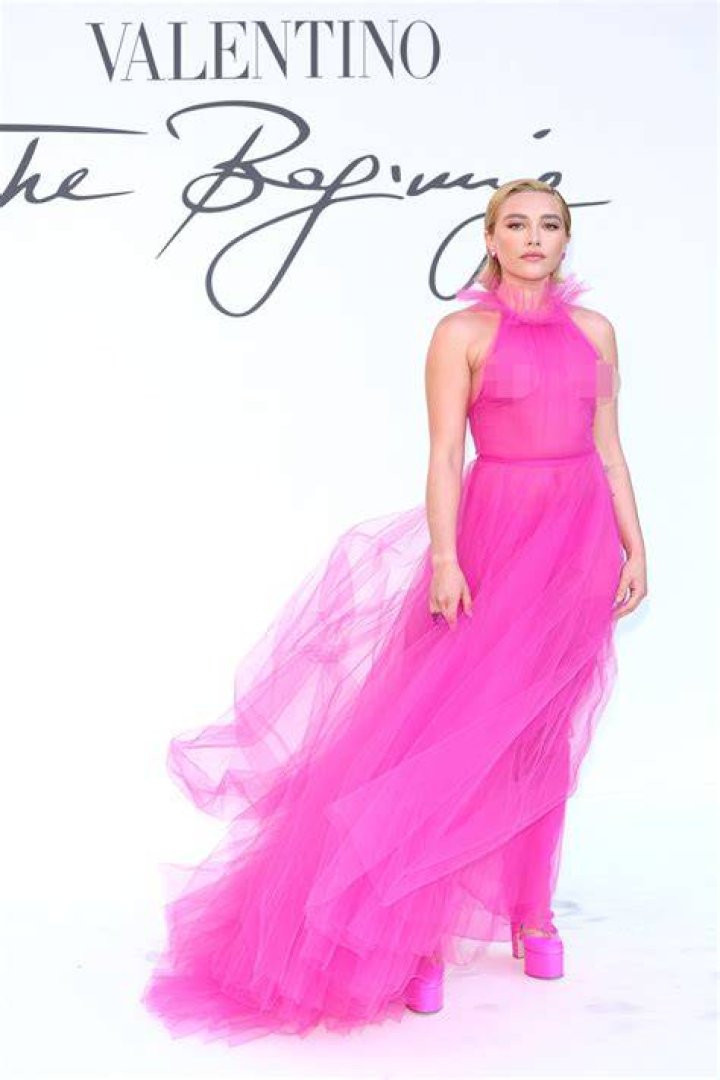 Florence Pugh rocks sheer pink dress at Valentino show