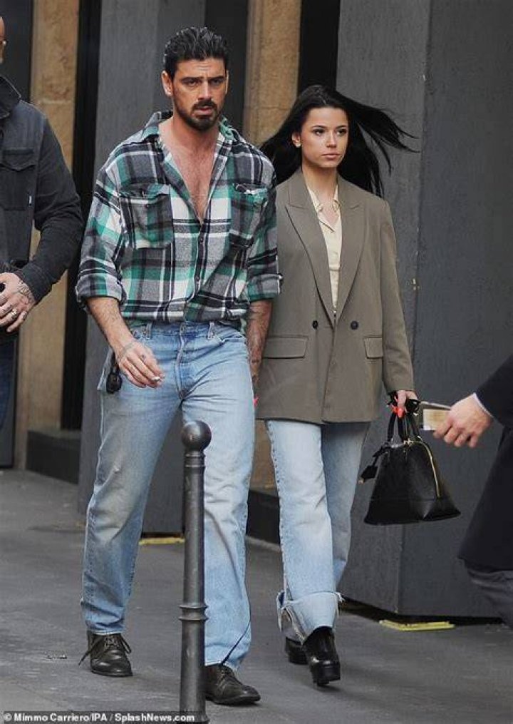 Michele Morrone rocks a rugged look while out with his exwife and