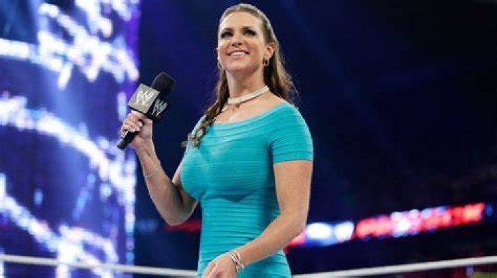 Stephanie McMahon in a blue jumpsuit at WrestleMania X8 2002
